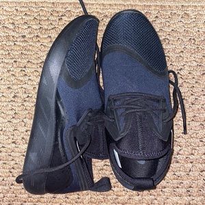 Black and blue Nike shoes